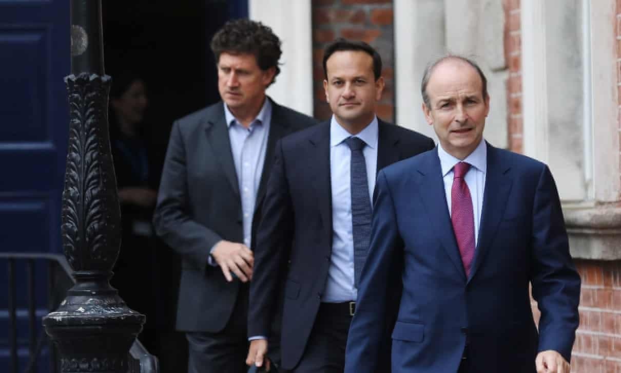Old civil war enemies form historic coalition government