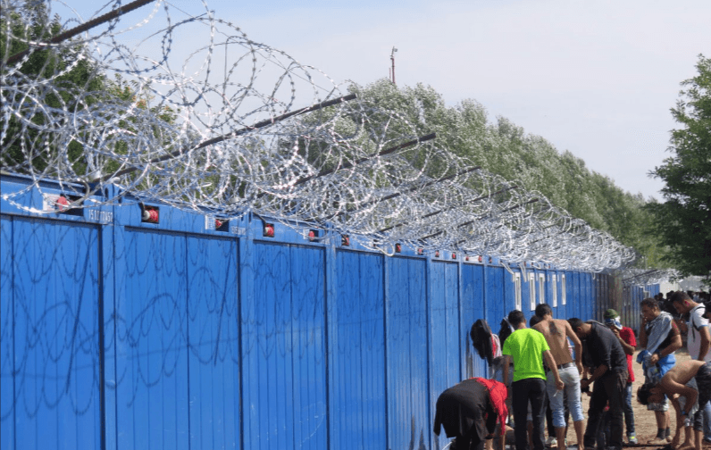 Hungary detains refugees in container camps
